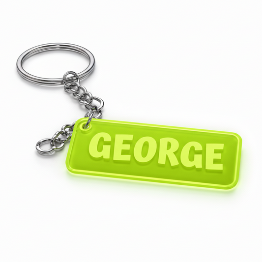 Keychain with a green tag labeled 'GEORGE' on a white background